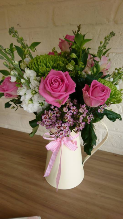 Full of Feeling - Fresh flowers presented in water to include a container. Nice seasonal mix in shades pinks, white and greens.